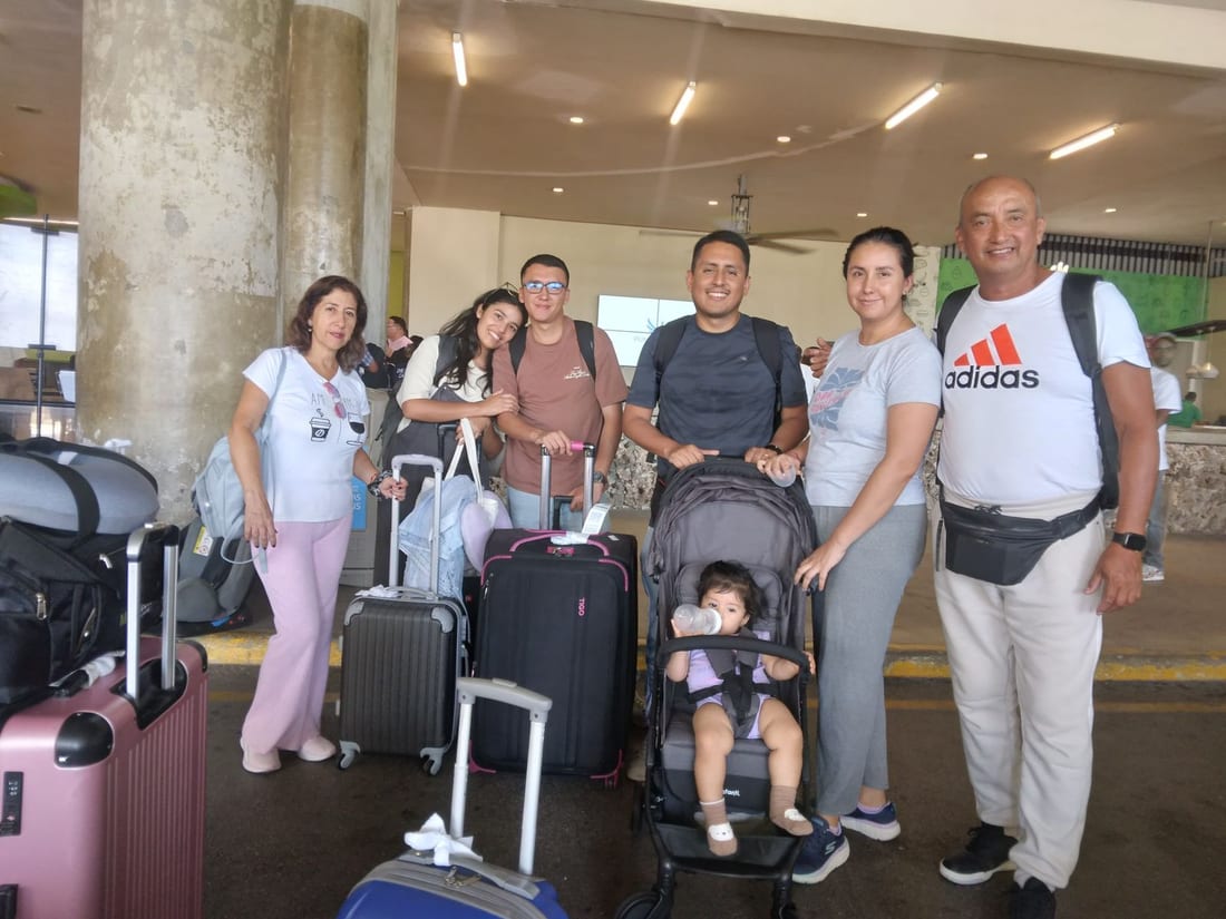 Family group with their luggage at the Punta Cana terminal